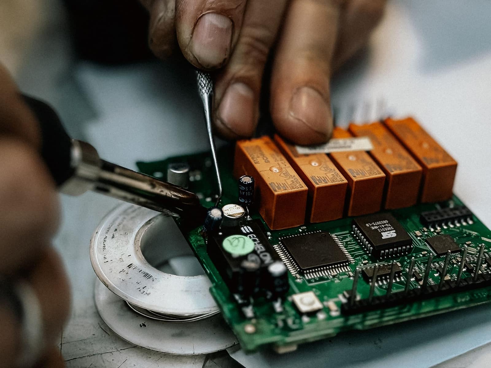 Components being assembled at a work bench